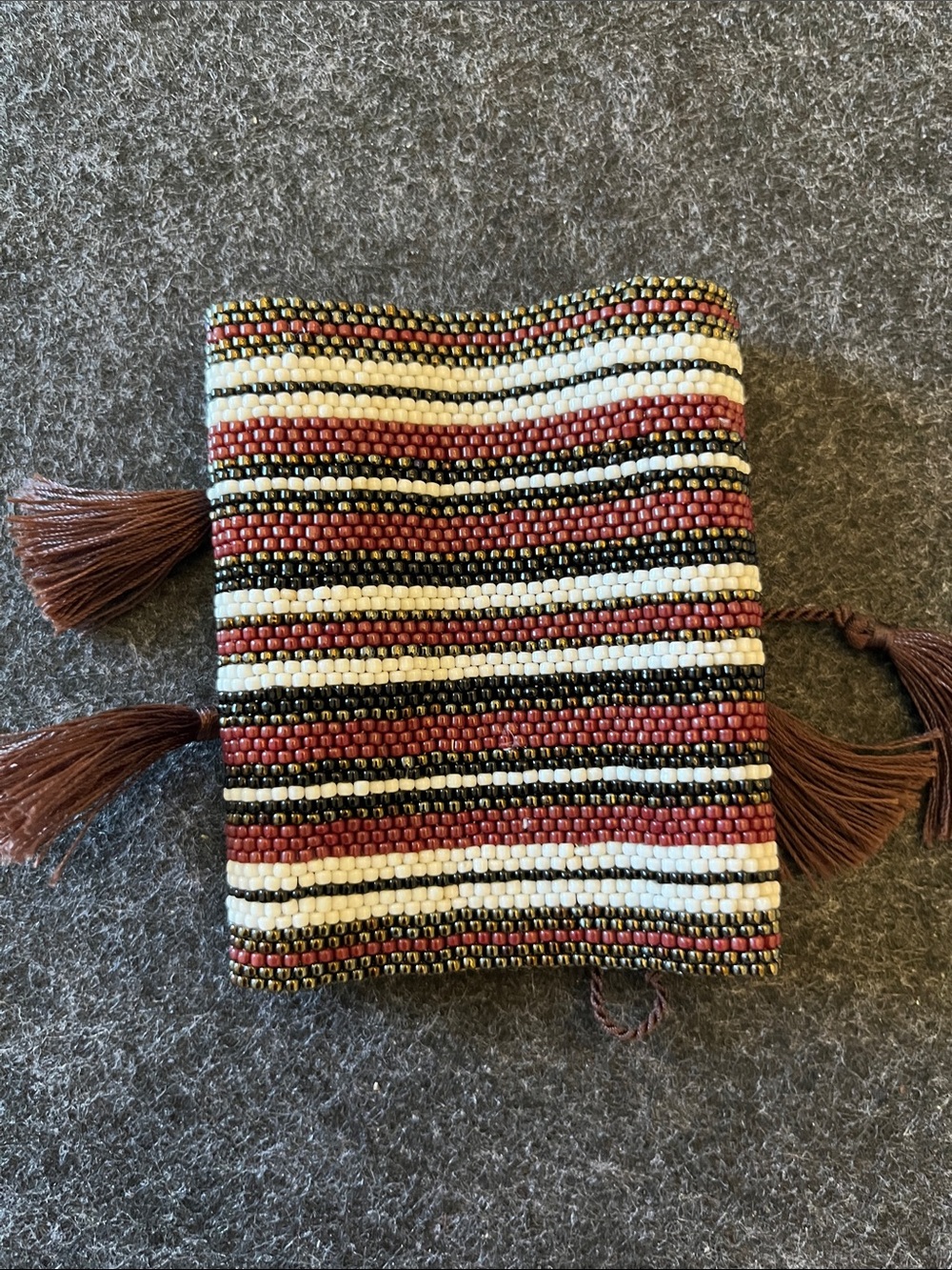 BEADED CUFFS WITH TASSEL TIES